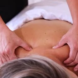 A back and shoulder massage in progress at The Med Spa Wimberley